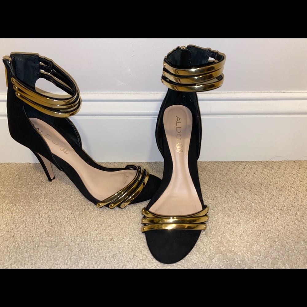 Black and gold high heels